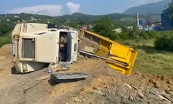 TOPRAK BOŞALTAN KAMYON DEVRİLDİ 1 YARALI