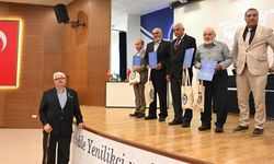 ÇAKÜ'DE ŞEHİT VE GAZİLER AYAKTA ALKIŞLANDI