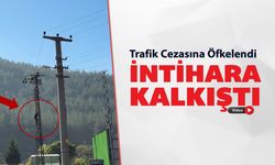 CEZAYA ÖFKELENEN SÜRÜCÜ ELEKTRİK DİREĞİNE ÇIKTI