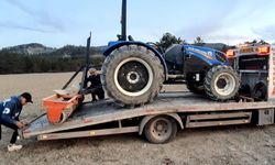 TARIM ALETİNİN ALTINDA KALAN ÇİFTÇİ AĞIR YARALANDI