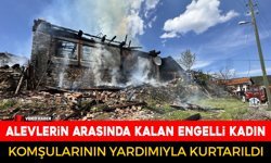 ALEVLERİN İÇİNDE KALAN ENGELLİ KADINI KOMŞULARI KURTARDI