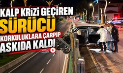 KALP KRİZİ GEÇİREN SÜRÜCÜ KORKULUKLARA ÇARPIP ASKIDA KALDI