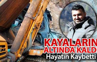 KAYALARIN ALTINDA KALDI