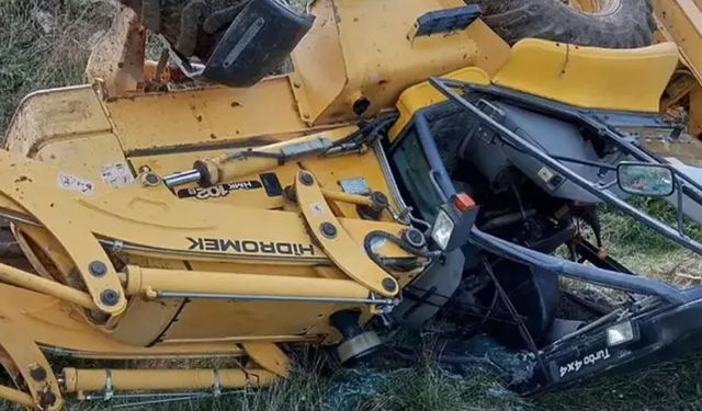 DEVRİLEN İŞ MAKİNESİNN ALTINDA OPERATÖRÜ HAYATINI KAYBETTİ