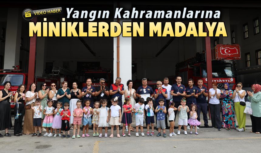 MİNİK YÜREKLERDEN KAHRAMAN İTFAİYECİLERE MADALYA