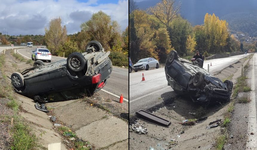 OTOMOBİL ORTA REFÜJE ÇARPIP TAKLA ATTI